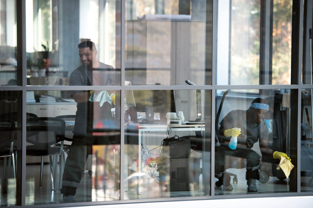 Professional cleaners working in a modern office space